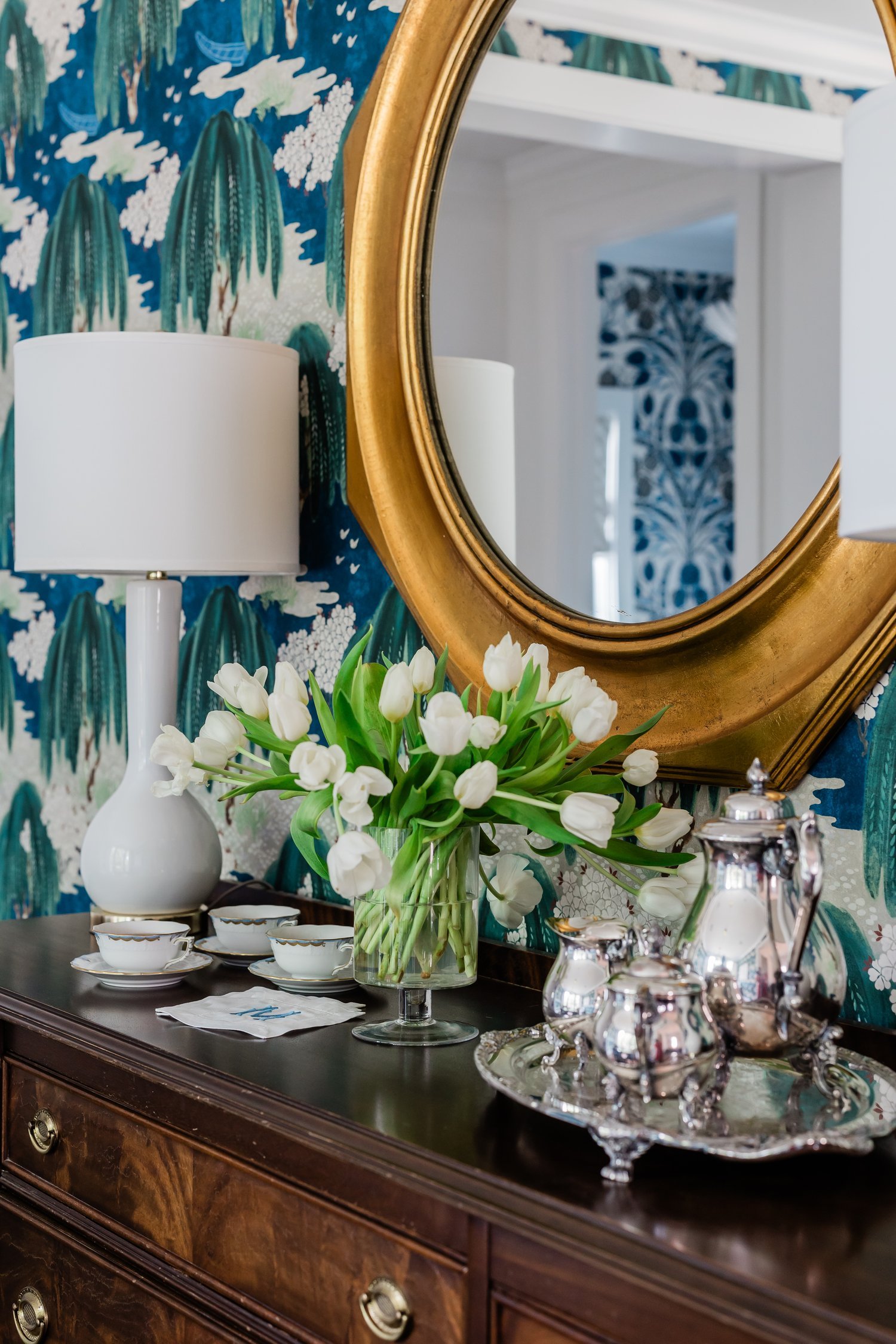 Dining room with classic colorful styling by a Raleigh NC interior designer