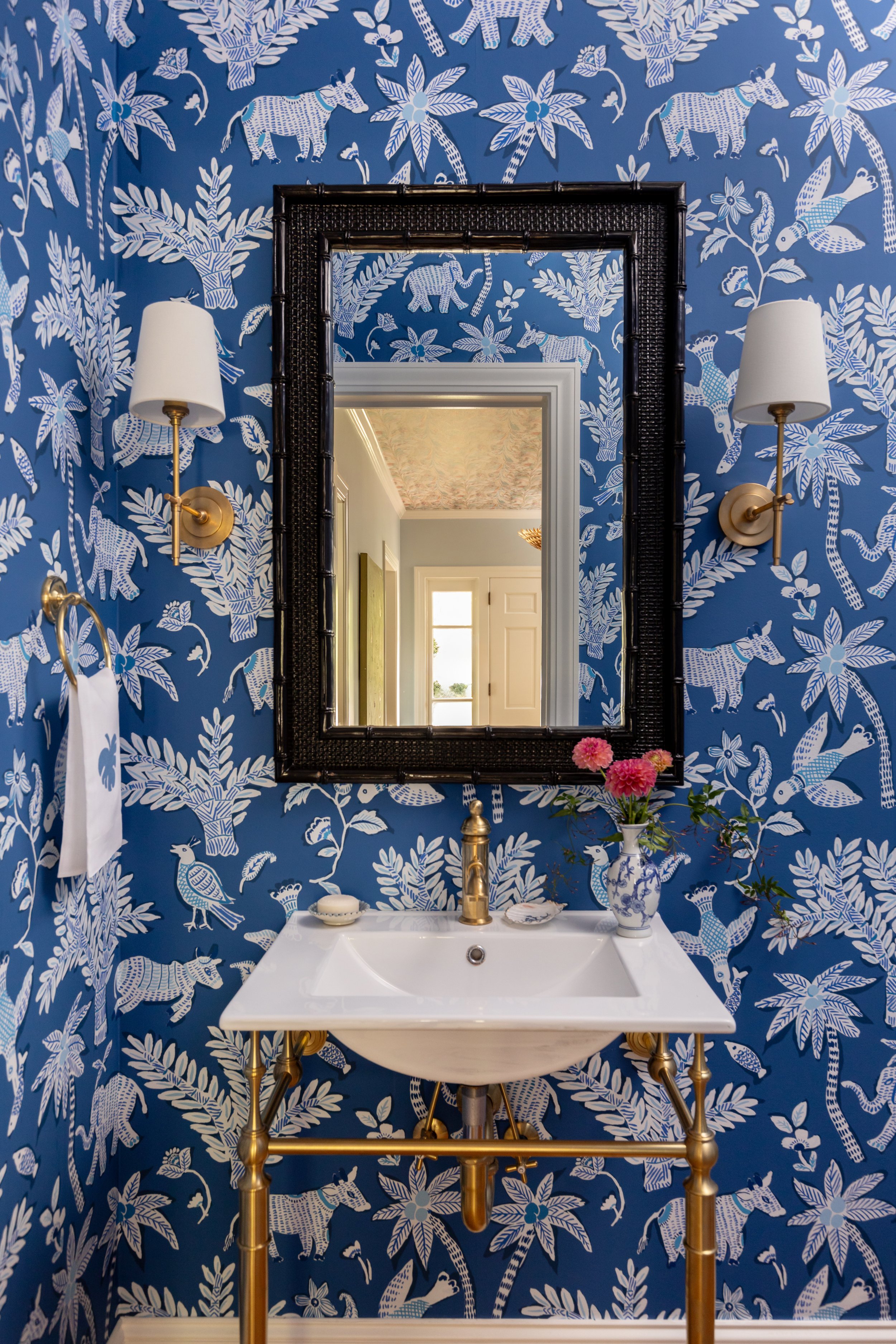 Inviting entryway with classic millwork and color, Raleigh interior design